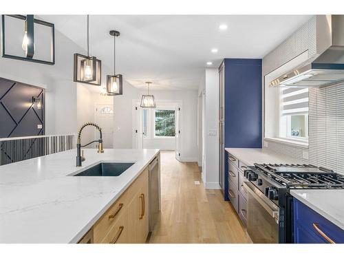 10 Glenmore Green Sw, Calgary, AB - Indoor Photo Showing Kitchen With Upgraded Kitchen