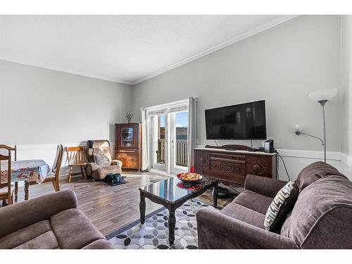 1-455 Huntsville Crescent Nw, Calgary, AB - Indoor Photo Showing Living Room