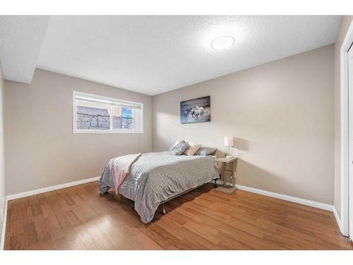 105-7416 Hunterview Drive Nw, Calgary, AB - Indoor Photo Showing Bedroom