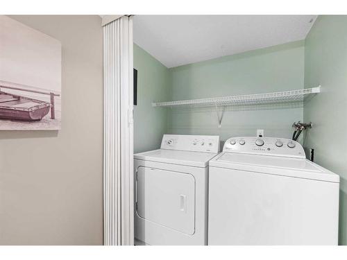 105-7416 Hunterview Drive Nw, Calgary, AB - Indoor Photo Showing Laundry Room