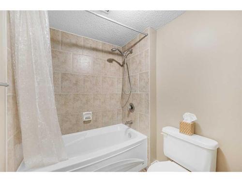 105-7416 Hunterview Drive Nw, Calgary, AB - Indoor Photo Showing Bathroom