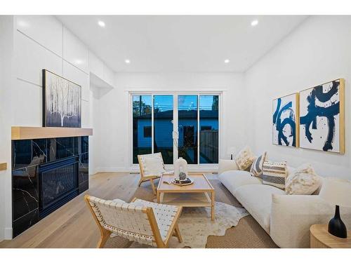 1820 19 Avenue Nw, Calgary, AB - Indoor Photo Showing Living Room With Fireplace