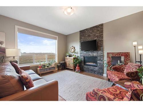 292 Ranch Close, Strathmore, AB - Indoor Photo Showing Living Room With Fireplace