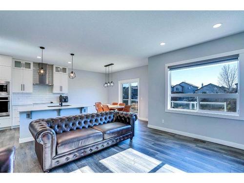 937 Midtown Avenue Sw, Airdrie, AB - Indoor Photo Showing Living Room