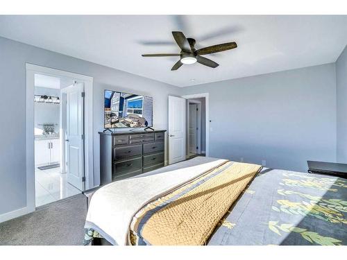 937 Midtown Avenue Sw, Airdrie, AB - Indoor Photo Showing Bedroom