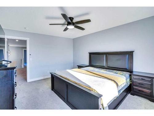 937 Midtown Avenue Sw, Airdrie, AB - Indoor Photo Showing Bedroom