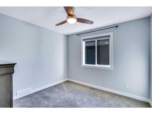 937 Midtown Avenue Sw, Airdrie, AB - Indoor Photo Showing Other Room