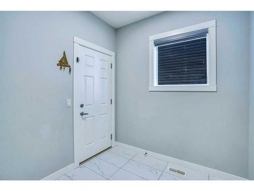 937 Midtown Avenue Sw, Airdrie, AB - Indoor Photo Showing Other Room