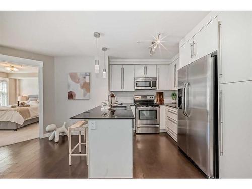 1118-11 Mahogany Row Se, Calgary, AB - Indoor Photo Showing Kitchen With Stainless Steel Kitchen