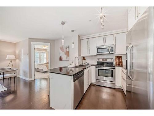 1118-11 Mahogany Row Se, Calgary, AB - Indoor Photo Showing Kitchen With Stainless Steel Kitchen With Upgraded Kitchen