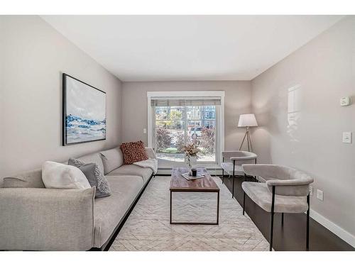 1118-11 Mahogany Row Se, Calgary, AB - Indoor Photo Showing Living Room