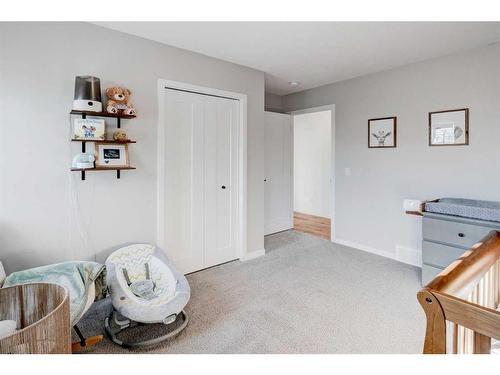 244 Ellen Way, Crossfield, AB - Indoor Photo Showing Bedroom