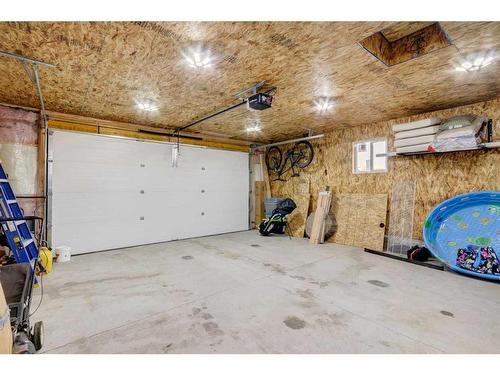 244 Ellen Way, Crossfield, AB - Indoor Photo Showing Garage