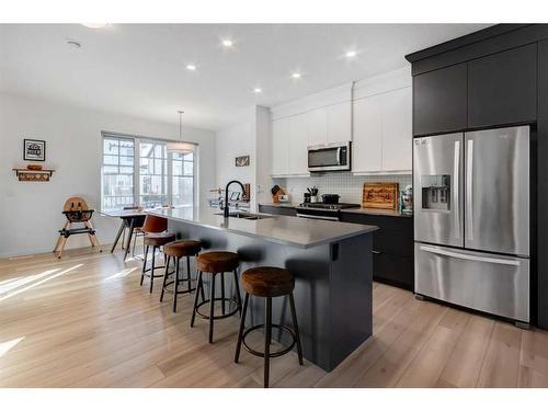 244 Ellen Way, Crossfield, AB - Indoor Photo Showing Kitchen With Stainless Steel Kitchen With Double Sink With Upgraded Kitchen