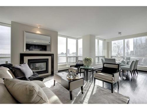 2113-222 Riverfront Avenue Sw, Calgary, AB - Indoor Photo Showing Living Room With Fireplace