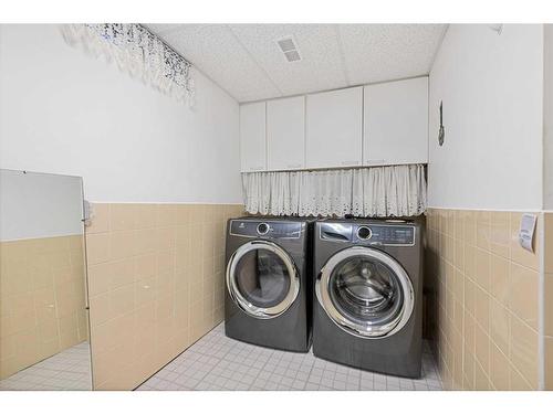 5711 Lawson Place Sw, Calgary, AB - Indoor Photo Showing Laundry Room