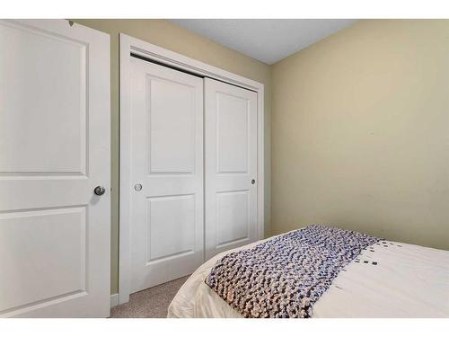 107-300 Marina Drive, Chestermere, AB - Indoor Photo Showing Bedroom