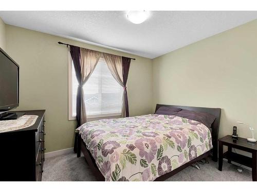 107-300 Marina Drive, Chestermere, AB - Indoor Photo Showing Bedroom