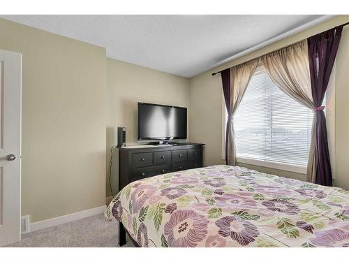 107-300 Marina Drive, Chestermere, AB - Indoor Photo Showing Bedroom