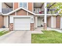 107-300 Marina Drive, Chestermere, AB  - Outdoor With Facade 