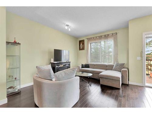 107-300 Marina Drive, Chestermere, AB - Indoor Photo Showing Living Room