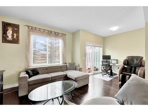 107-300 Marina Drive, Chestermere, AB - Indoor Photo Showing Living Room