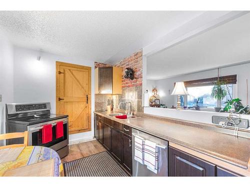 7635 21 Street Se, Calgary, AB - Indoor Photo Showing Kitchen With Double Sink