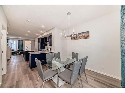 40 Edith Gate Nw, Calgary, AB - Indoor Photo Showing Dining Room