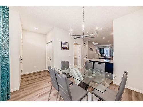 40 Edith Gate Nw, Calgary, AB - Indoor Photo Showing Dining Room