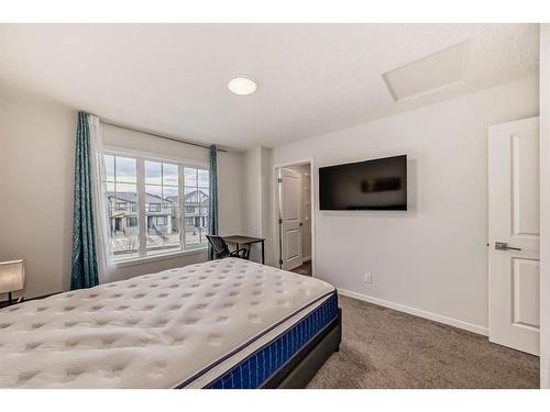 40 Edith Gate Nw, Calgary, AB - Indoor Photo Showing Bedroom