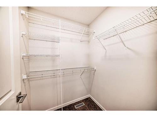 40 Edith Gate Nw, Calgary, AB - Indoor With Storage