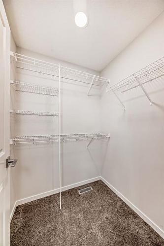 40 Edith Gate Nw, Calgary, AB - Indoor With Storage