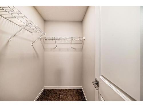 40 Edith Gate Nw, Calgary, AB - Indoor With Storage