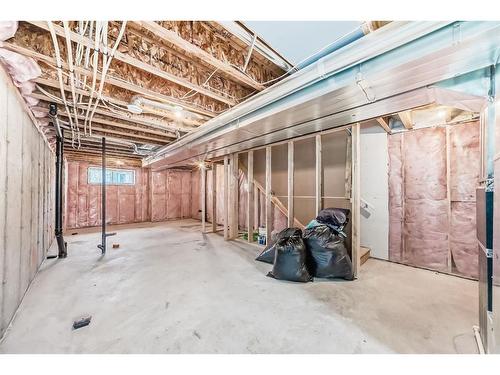 40 Edith Gate Nw, Calgary, AB - Indoor Photo Showing Basement