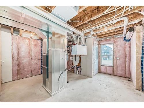 40 Edith Gate Nw, Calgary, AB - Indoor Photo Showing Basement