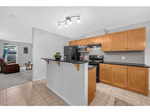 6 Luxstone Point Sw, Airdrie, AB - Indoor Photo Showing Kitchen