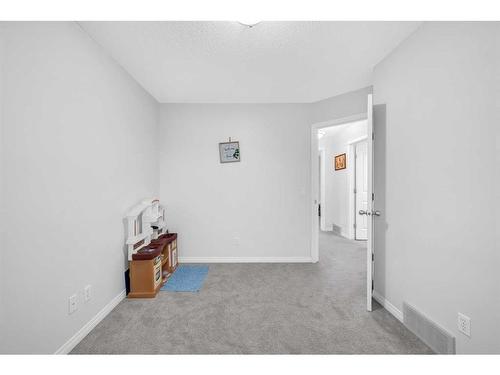 6 Luxstone Point Sw, Airdrie, AB - Indoor Photo Showing Other Room