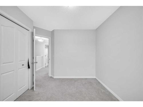 6 Luxstone Point Sw, Airdrie, AB - Indoor Photo Showing Other Room