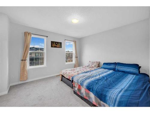 6 Luxstone Point Sw, Airdrie, AB - Indoor Photo Showing Bedroom