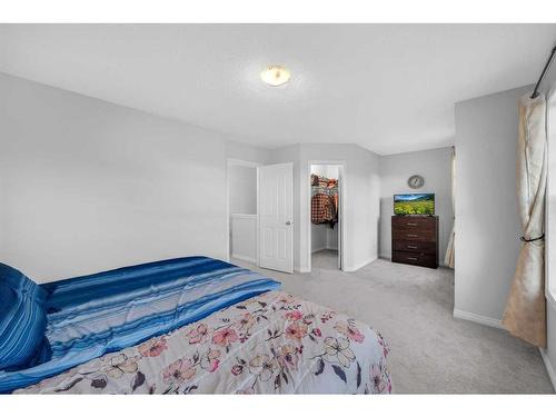 6 Luxstone Point Sw, Airdrie, AB - Indoor Photo Showing Bedroom