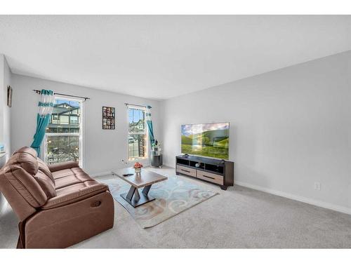 6 Luxstone Point Sw, Airdrie, AB - Indoor Photo Showing Living Room