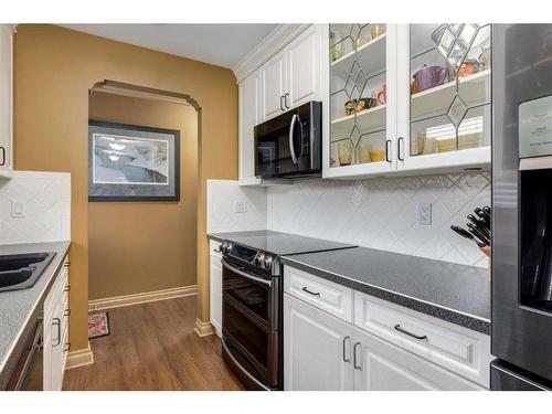 2211 45 Street Se, Calgary, AB - Indoor Photo Showing Kitchen With Double Sink