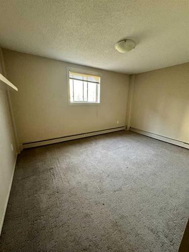 115-1411 7 Avenue Nw, Calgary, AB - Indoor Photo Showing Other Room