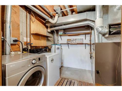 12 Ogmoor Crescent Se, Calgary, AB - Indoor Photo Showing Laundry Room