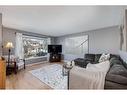 12 Ogmoor Crescent Se, Calgary, AB  - Indoor Photo Showing Living Room 