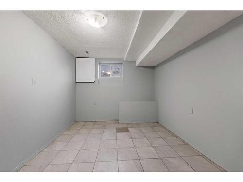 220 Forest Way Se, Calgary, AB - Indoor Photo Showing Other Room