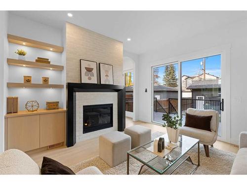 224 24 Avenue Nw, Calgary, AB - Indoor Photo Showing Living Room With Fireplace