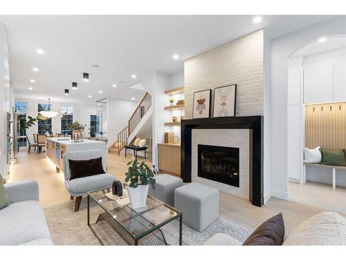 224 24 Avenue Nw, Calgary, AB - Indoor Photo Showing Living Room With Fireplace