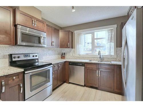 1802-2461 Baysprings Link Sw, Airdrie, AB - Indoor Photo Showing Kitchen With Stainless Steel Kitchen With Upgraded Kitchen