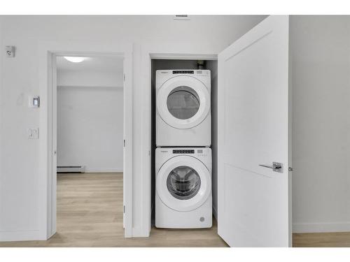 406-30 Sage Hill Walk Nw, Calgary, AB - Indoor Photo Showing Laundry Room